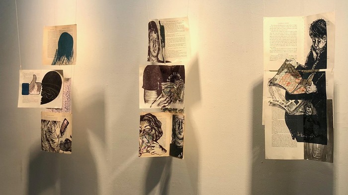 Mary V. Marsh, Between Here & Now, linoleum cut on book pages, wax rubbings, linen thread, 5' x 8' x 5", $1,500