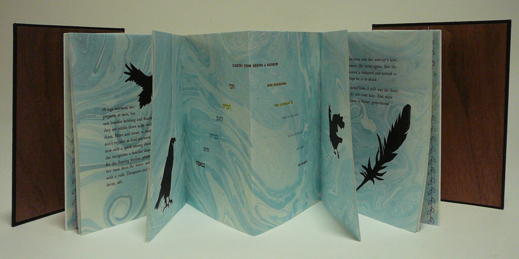 Alisa Golden Birds of the Bible: Raven letterpress and linocut on suminagashi, accordion-fold book with signatures 7.5" x 5.75" x .25" Alisa Golden Birds of the Bible: Raven letterpress and linocut on suminagashi, accordion-fold book with signatures 7.5" x 5.75" x .25"